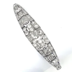 An Art Déco platinum, brilliant-cut and cushion-cut diamond bracelet. France, 1930.