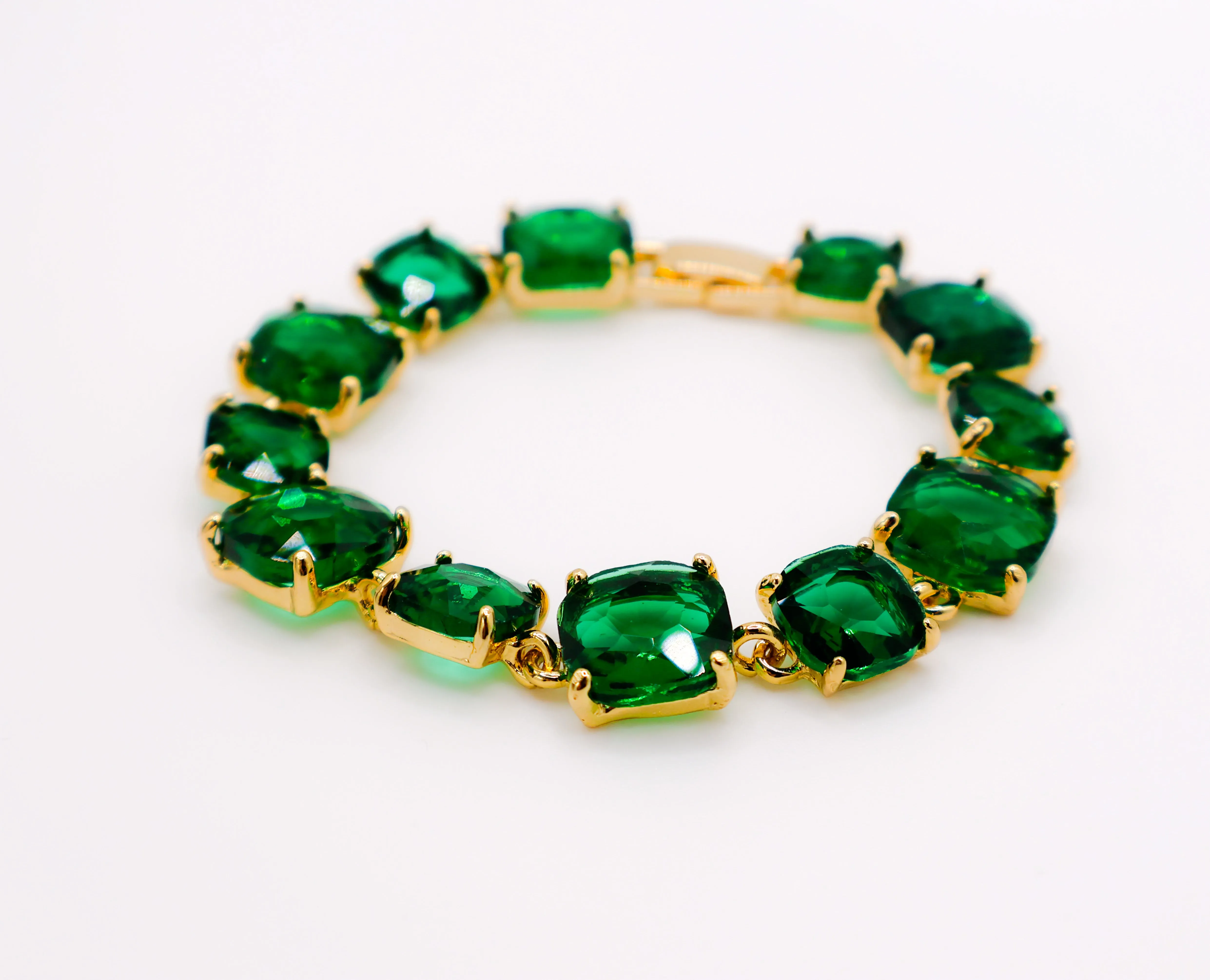 Emerald Elegance Gold-Plated Faux Diamond Bracelet