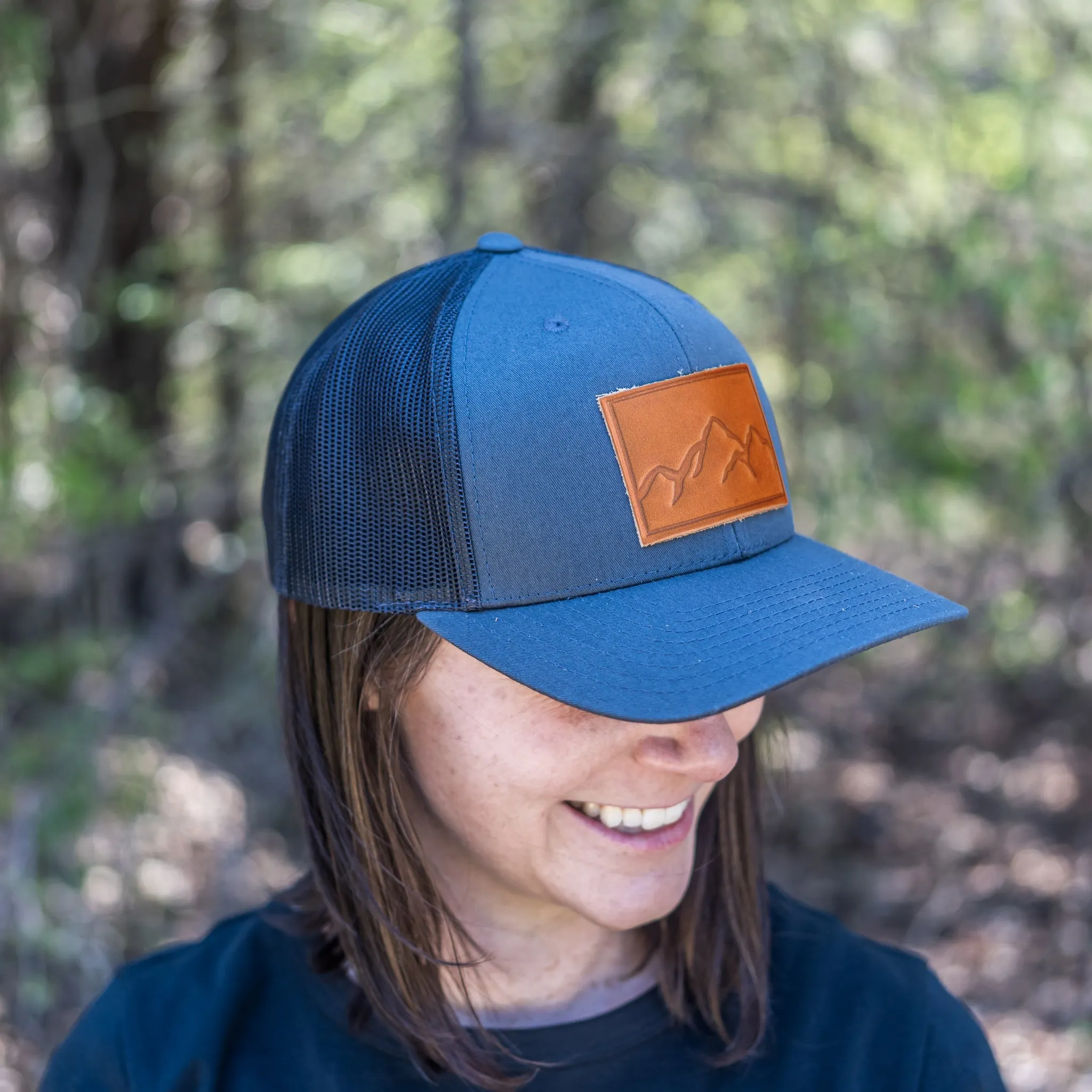 Leather Patch Trucker Style Hat - Mountain Range Stamp