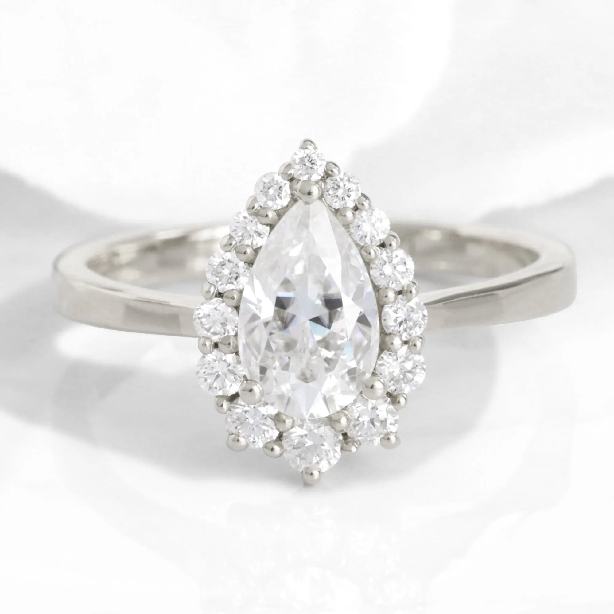 Pear Moissanite Engagement Ring in Tiara Halo Diamond Tapered Band