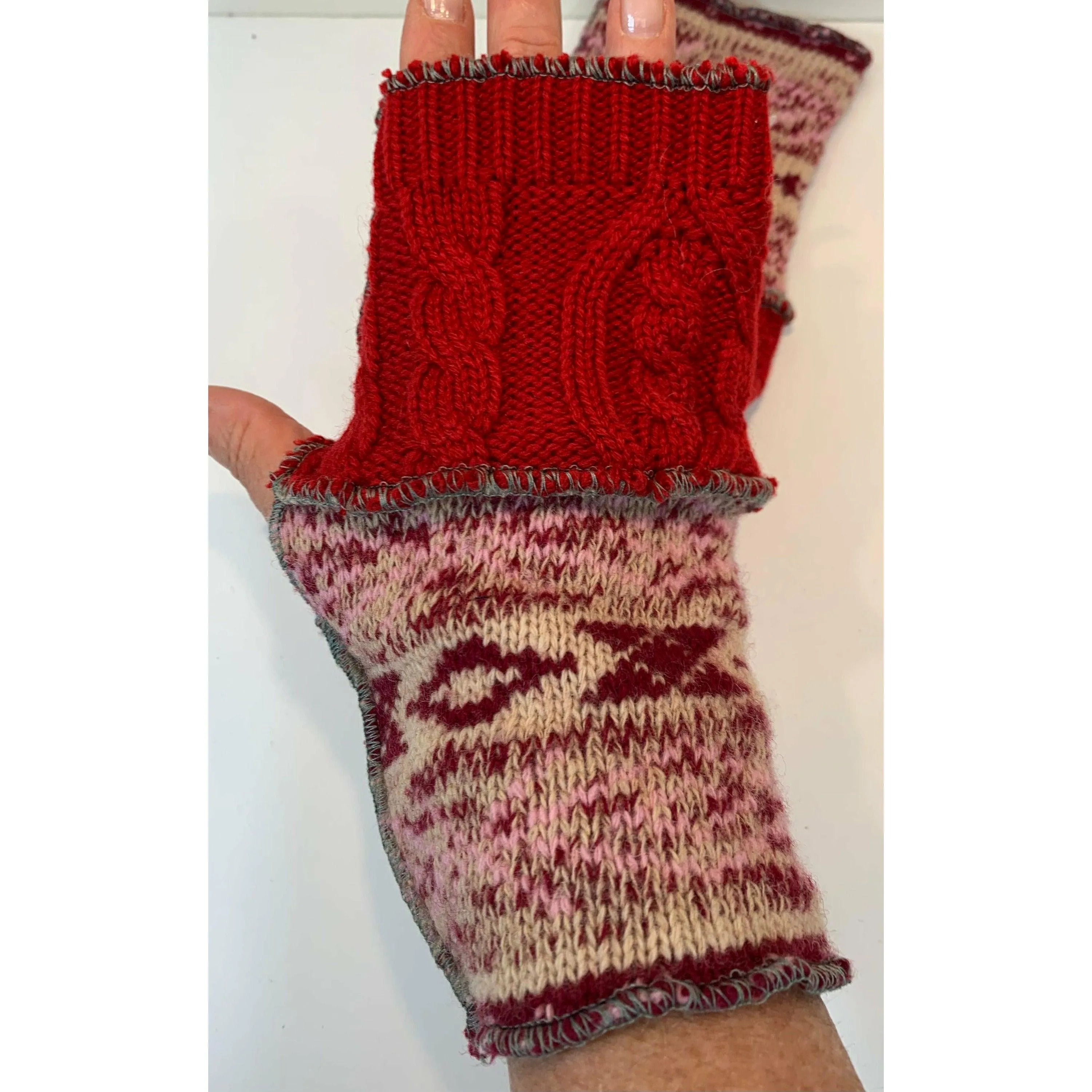 Recycled knit Scandinavian pattern sweater fingerless gloves in reds, pink n white n cables. Wear for fun, school, cashiers, fingers free.